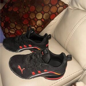 Puma Kids Black Sneakers with Red and Orange Accents